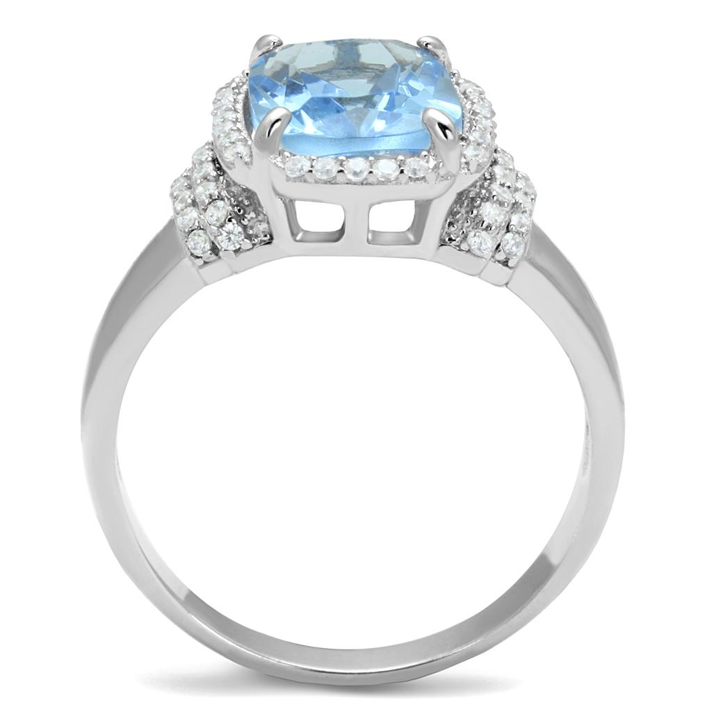 TS562 Rhodium 925 Sterling Silver Ring featuring a light sapphire synthetic glass center stone, elegantly designed for modern style.