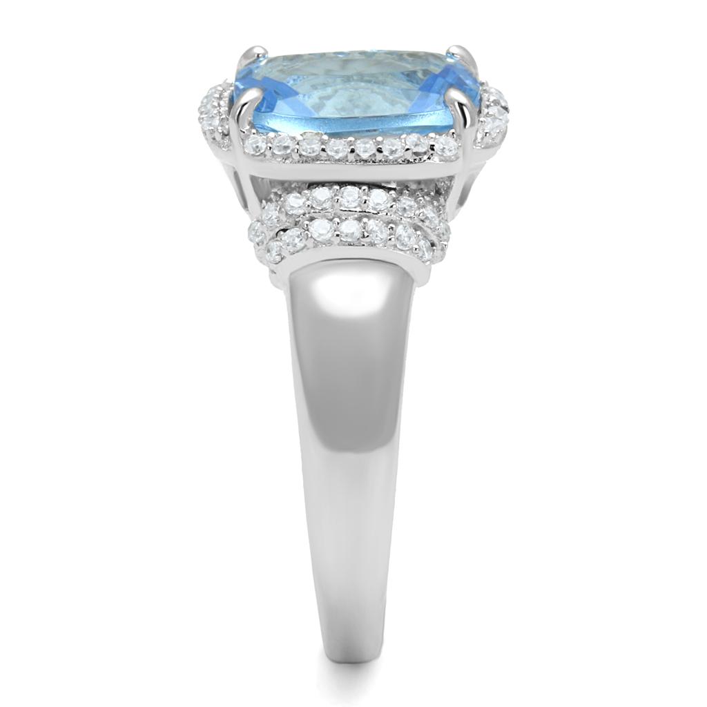 TS562 Rhodium 925 Sterling Silver Ring featuring a light sapphire synthetic glass center stone, elegantly designed for modern style.