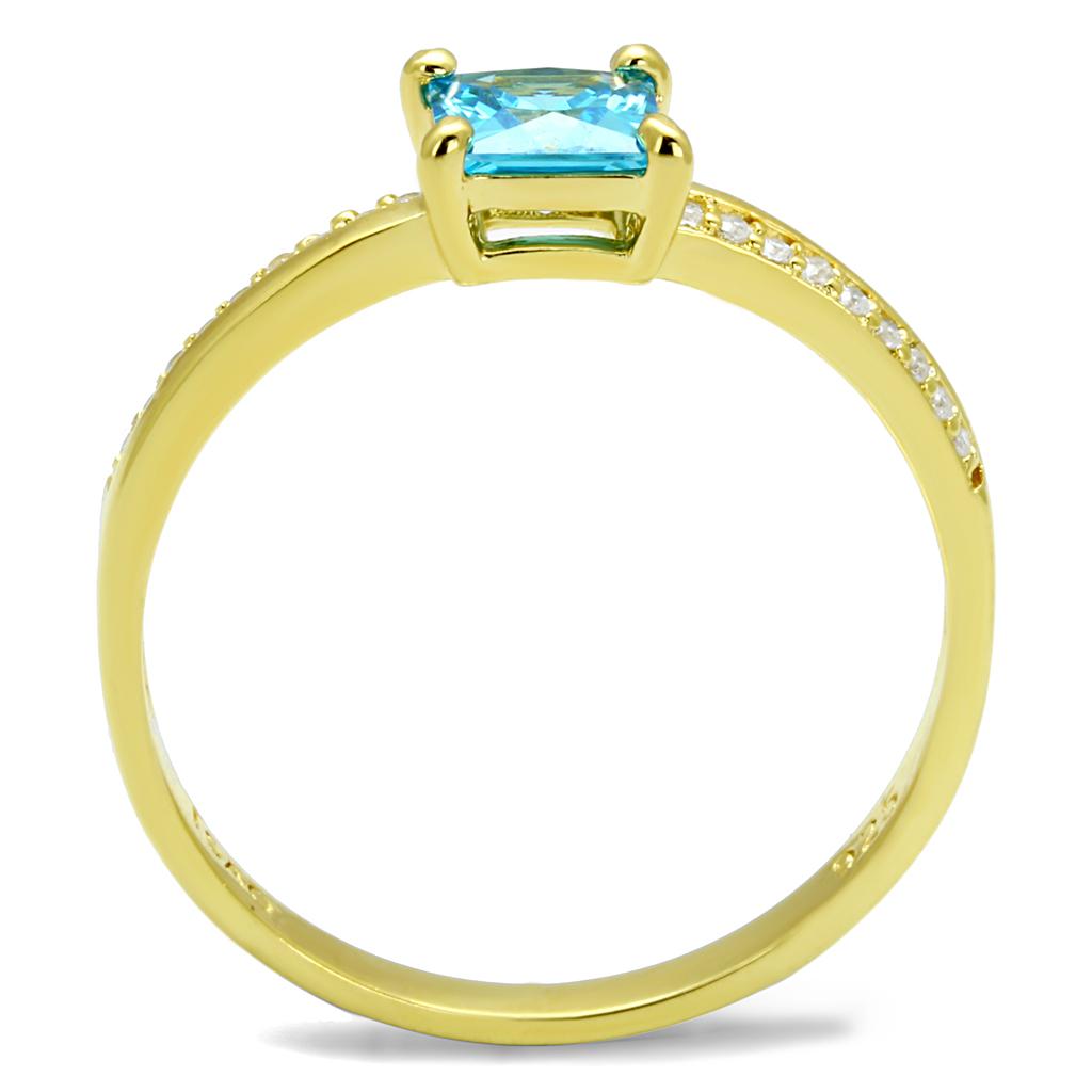 TS559 Gold 925 Sterling Silver Ring featuring a vibrant sea blue AAA Grade CZ stone, elegantly designed for luxury and comfort.