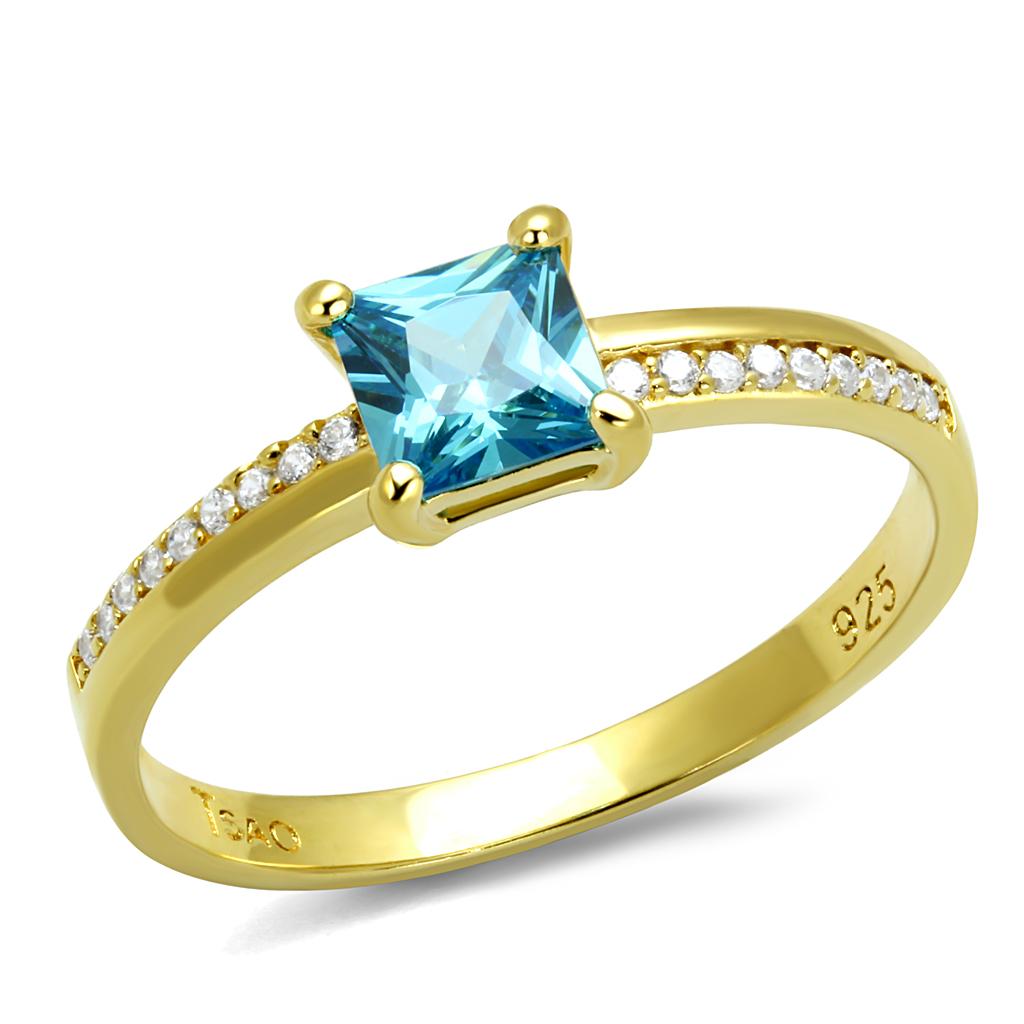 TS559 Gold 925 Sterling Silver Ring featuring a vibrant sea blue AAA Grade CZ stone, elegantly designed for luxury and comfort.