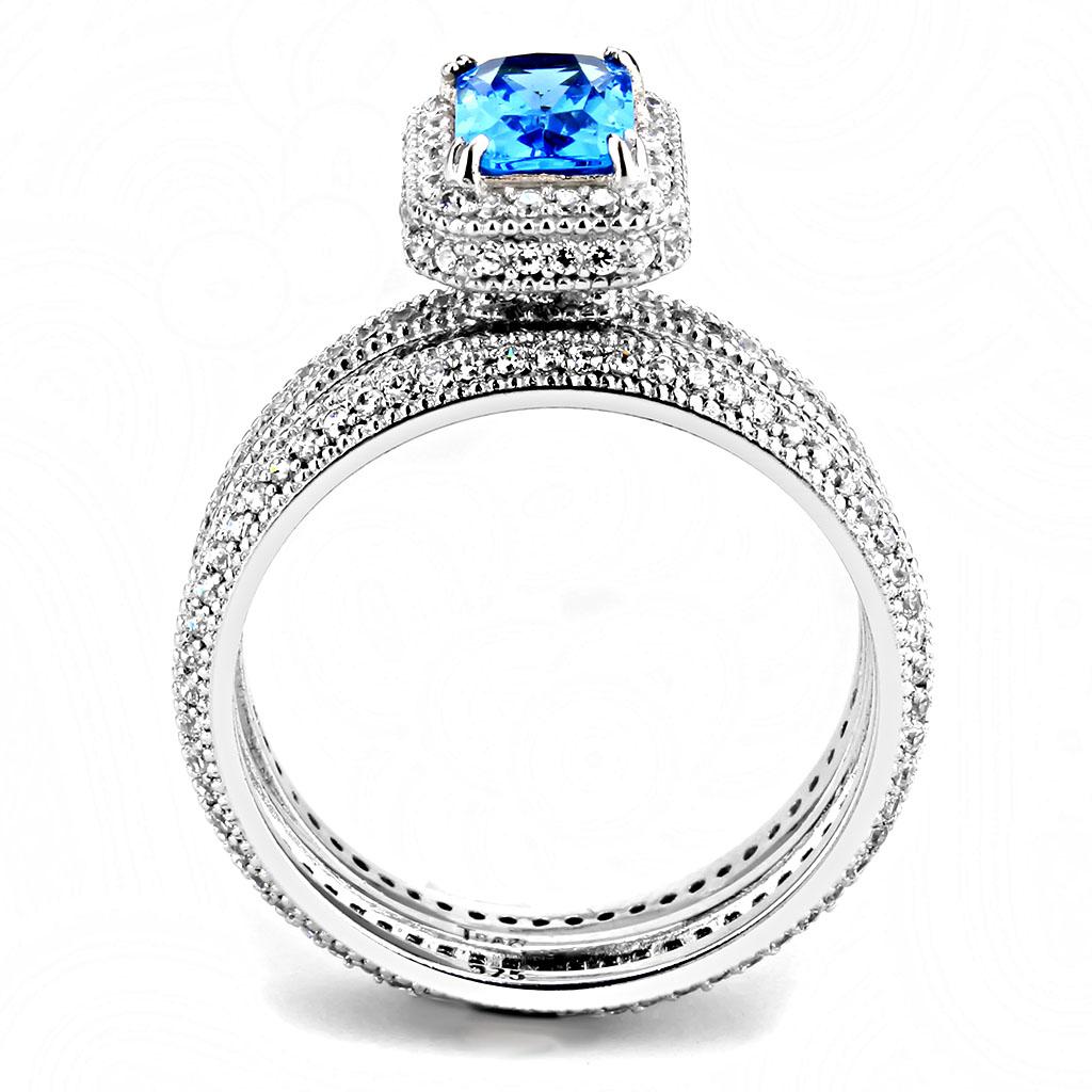 TS615 Rhodium 925 Sterling Silver Ring featuring a sea blue synthetic glass stone, showcasing its elegant design and shiny finish.