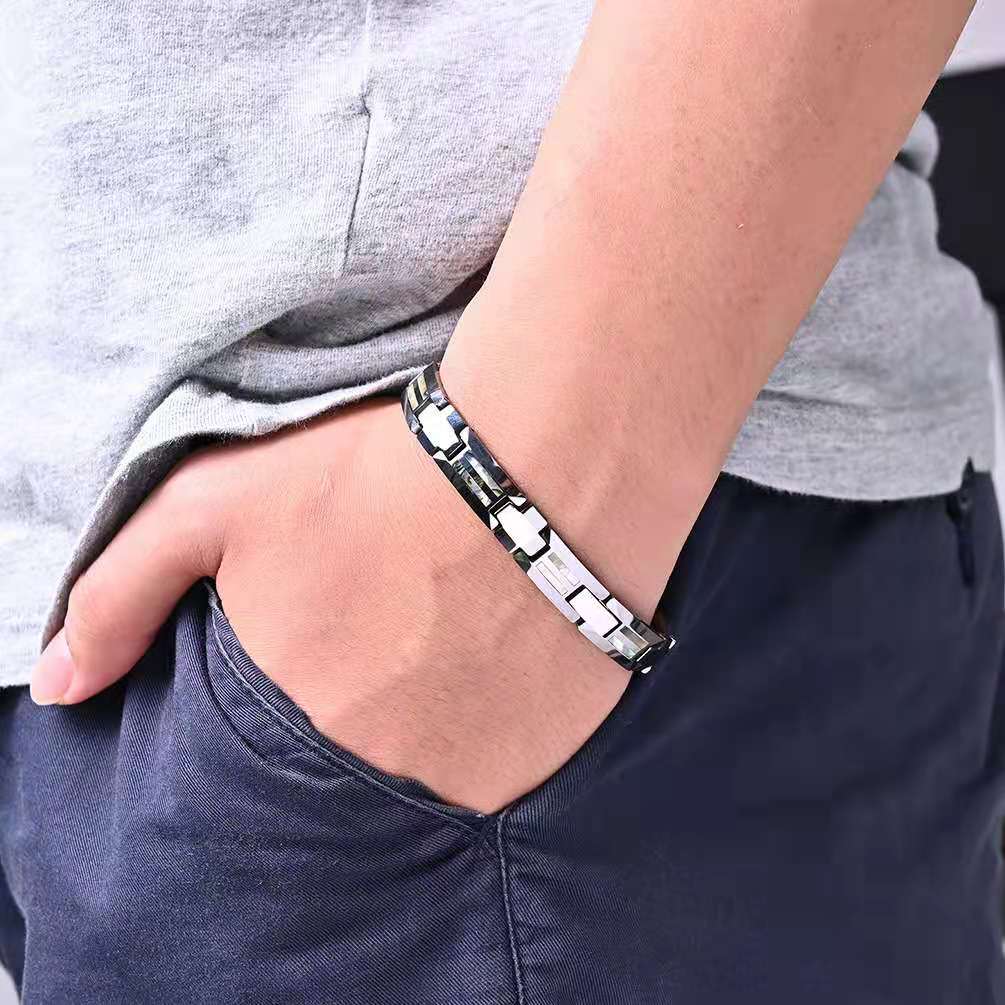 A stylish grey tungsten bracelet for men, showcasing its elegant design and durable construction, perfect for any occasion.