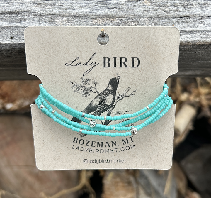 Turquoise and chunky gold or silver boho beaded wrap bracelet, showcasing vibrant Czech glass seed beads and metallic accents.