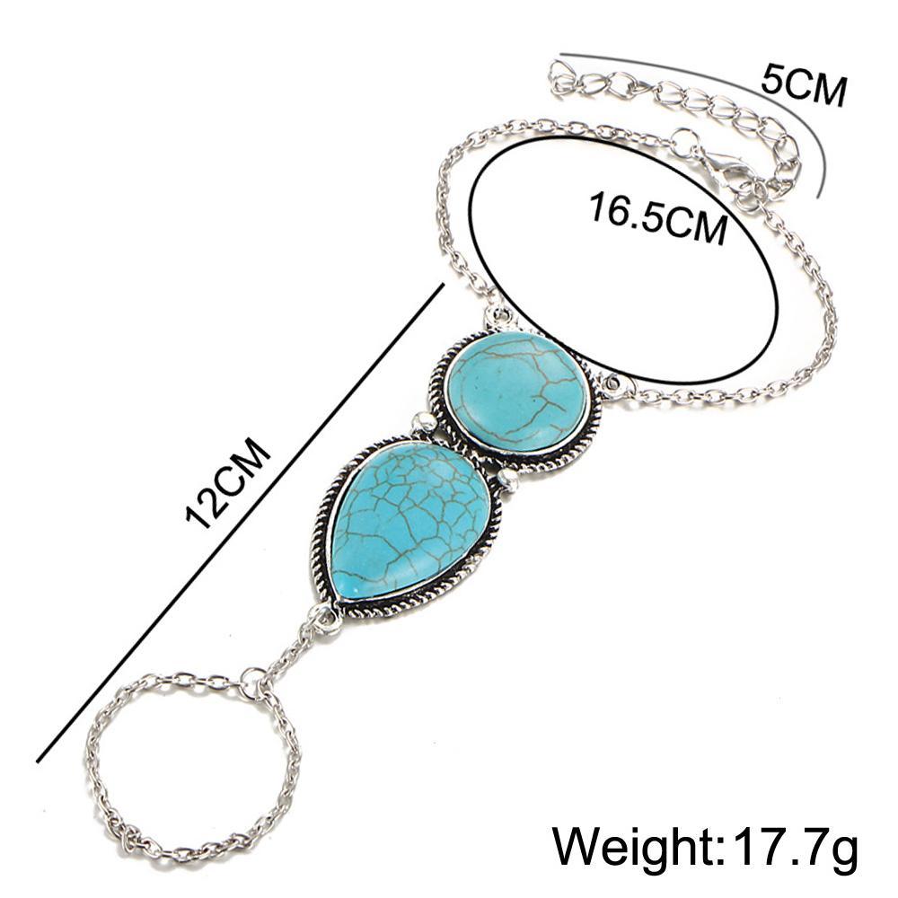 Turquoise hand bracelet featuring 18K gold plating, showcasing Italian craftsmanship and elegant design.