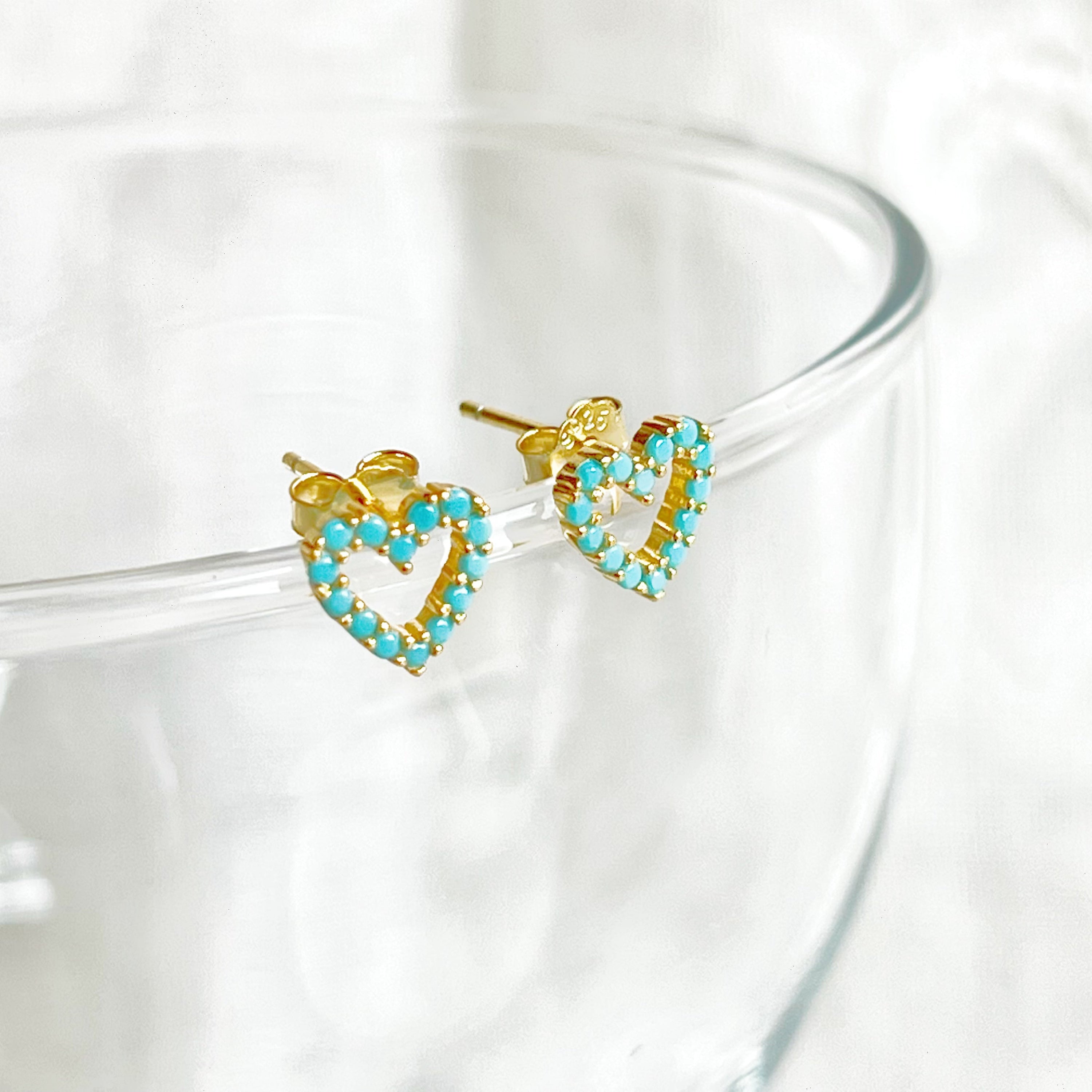 Turquoise Heart Sterling Silver Stud Earrings featuring mini turquoise stones and gold-plated sterling silver base, elegantly designed.