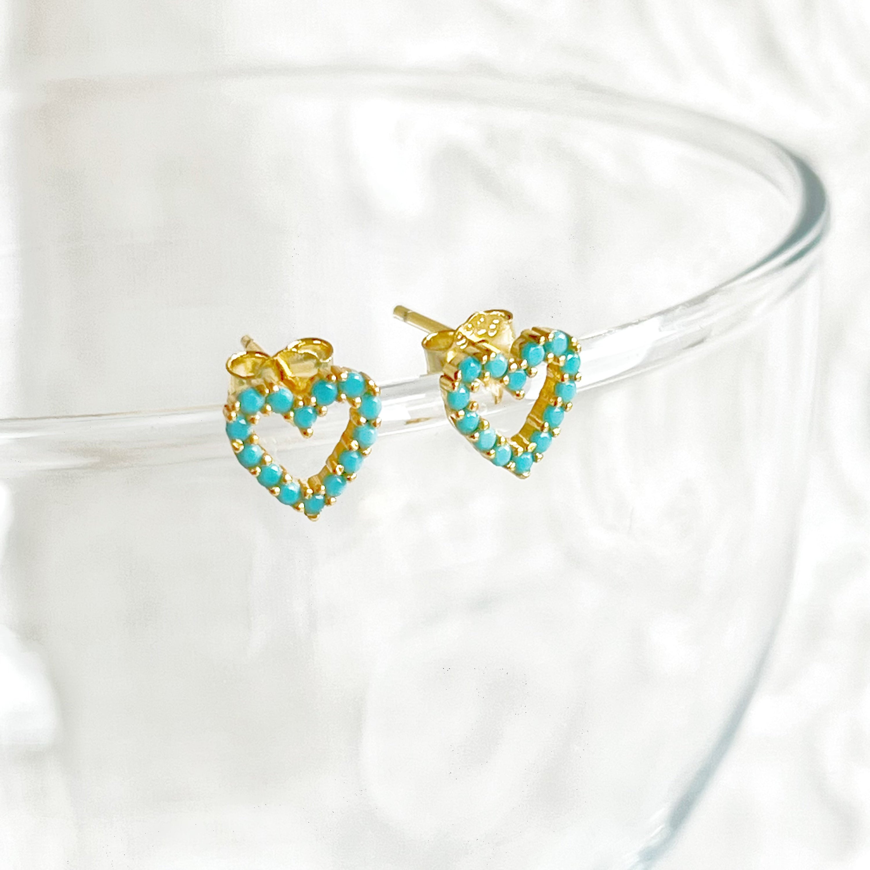 Turquoise Heart Sterling Silver Stud Earrings featuring mini turquoise stones and gold-plated sterling silver base, elegantly designed.