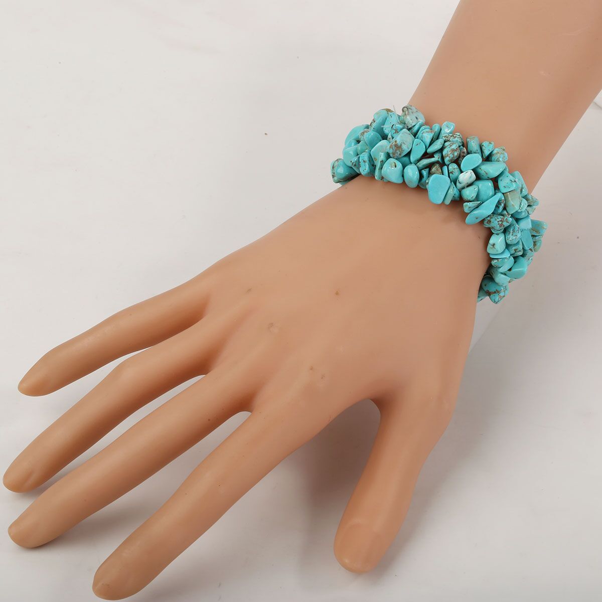 Turquoise Stretch Cuff 5 Layer Braided Chunky Chakra Bracelet showcasing natural turquoise stones and a unique handmade design.