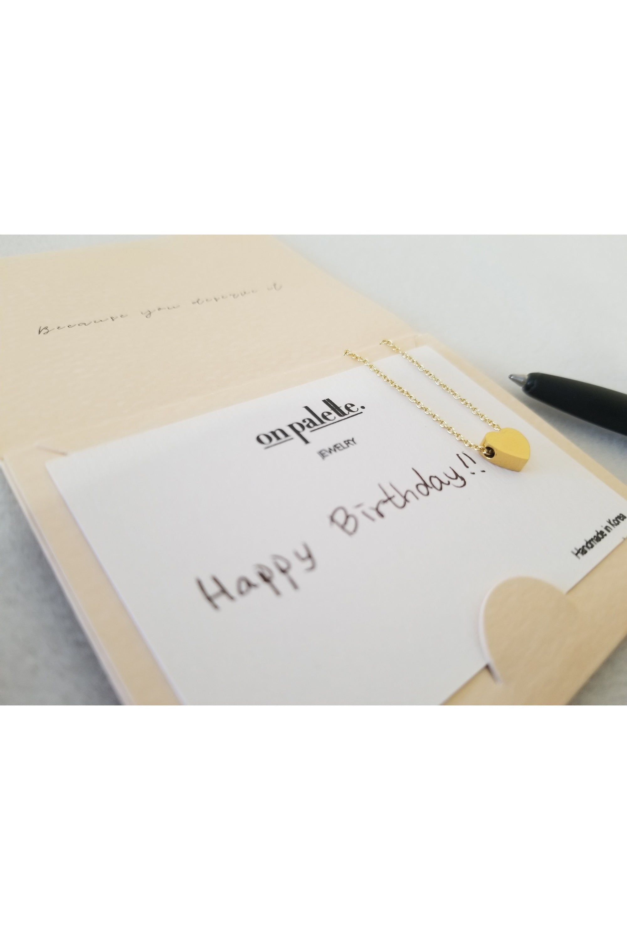 A stylish Turtle Pendant Necklace by DOBBI, featuring a turtle-shaped pendant made of stainless steel, available in various colors.