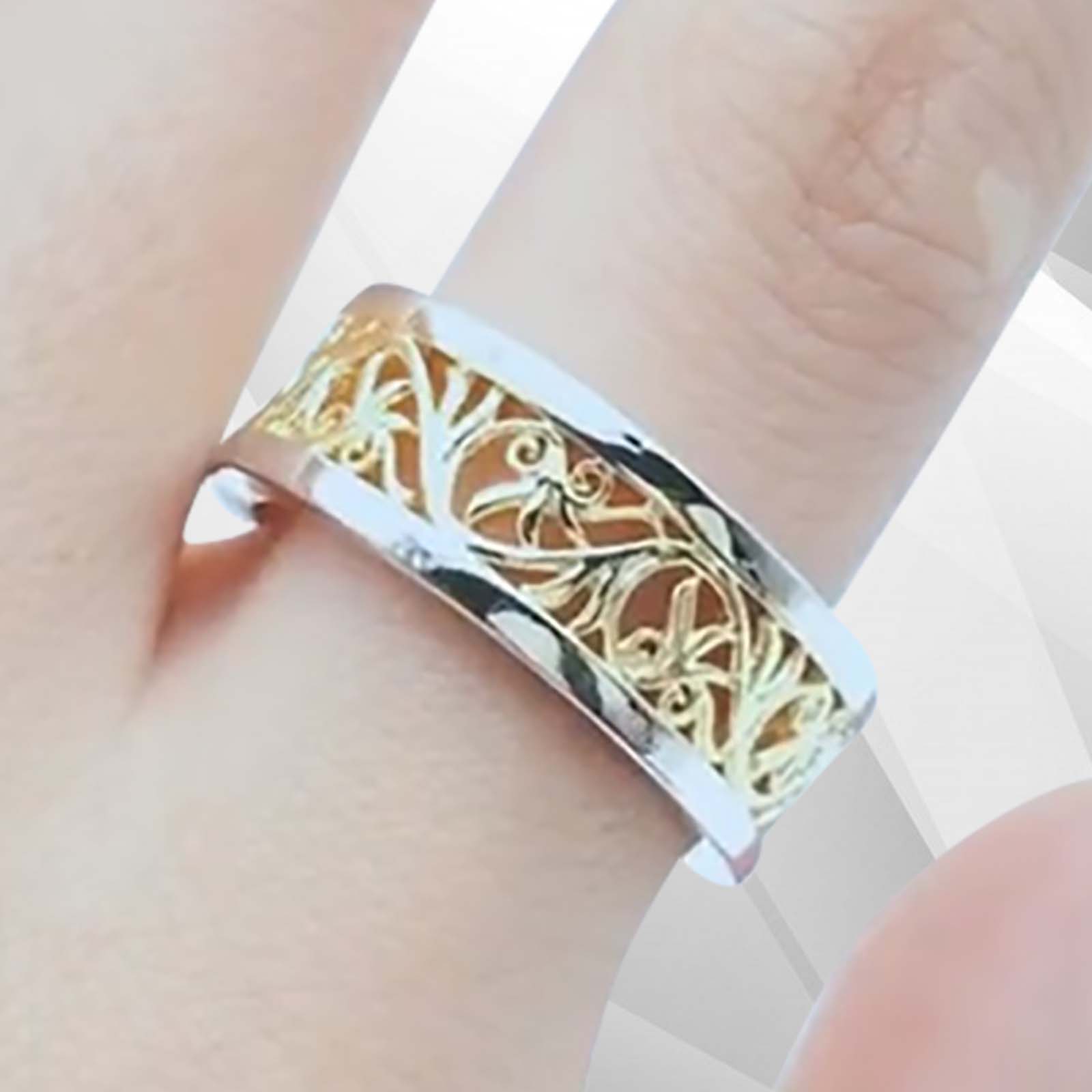 Two Colour 18Ct Yellow and White Gold Over Celtic Wedding Ring Band showcasing intricate design and elegant finish.