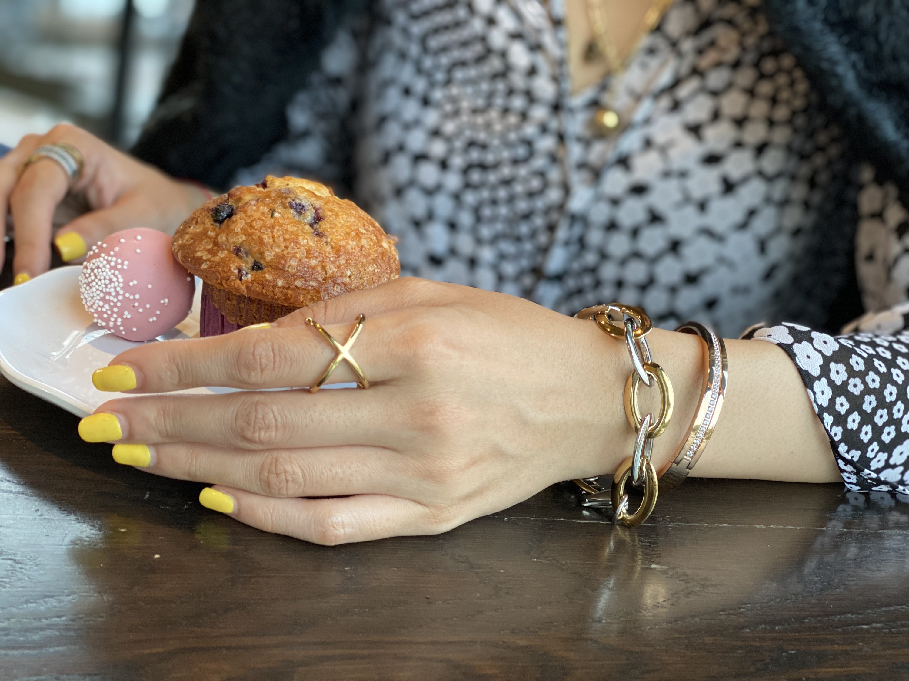 Two-Tone Oval Link Bracelet made of stainless steel with gold plating, showcasing its elegant design and durable construction.