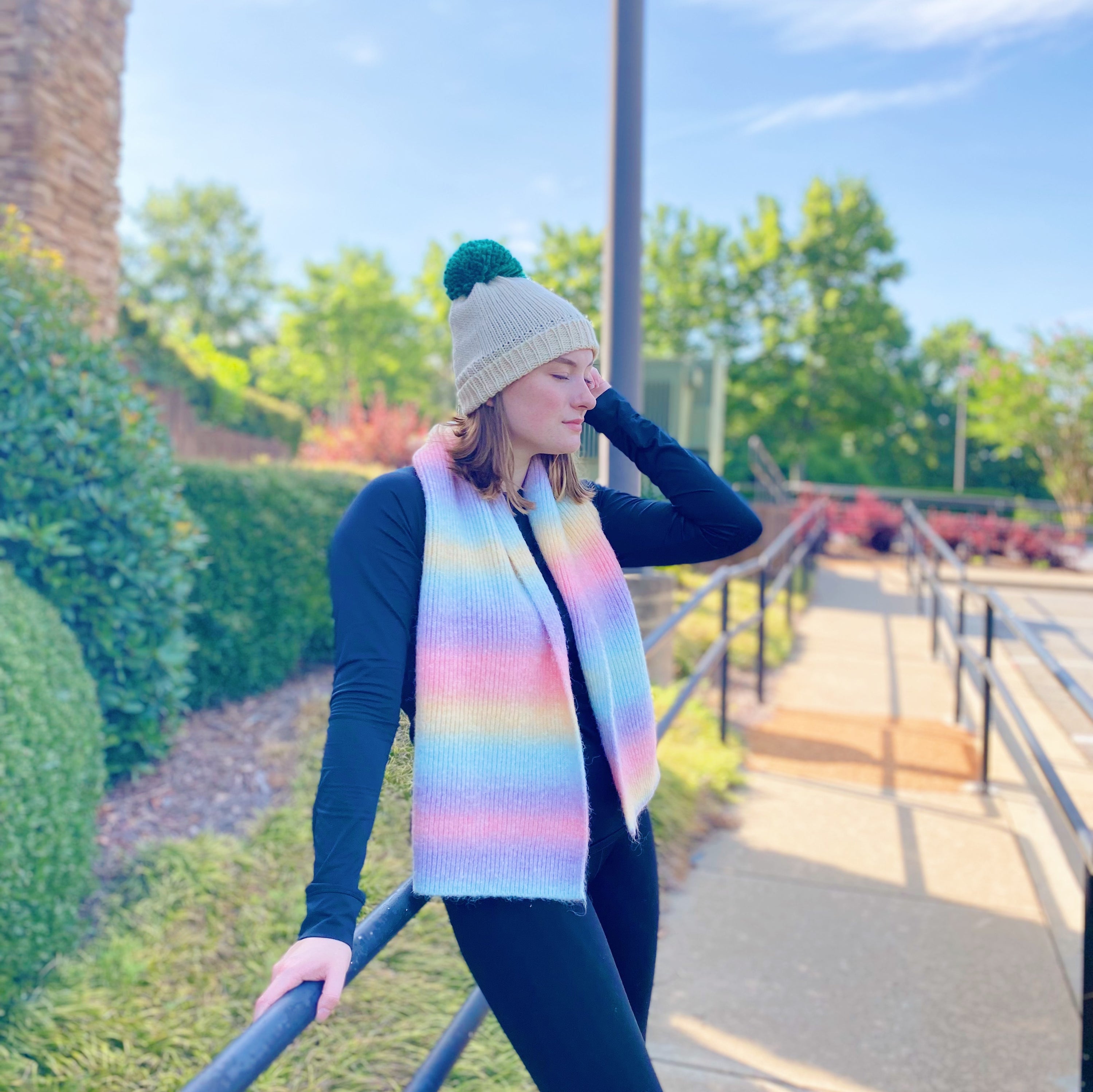 A vibrant Unicorn In My Dream Cozy Knit Scarf featuring a colorful knit pattern, perfect for adding warmth and style.