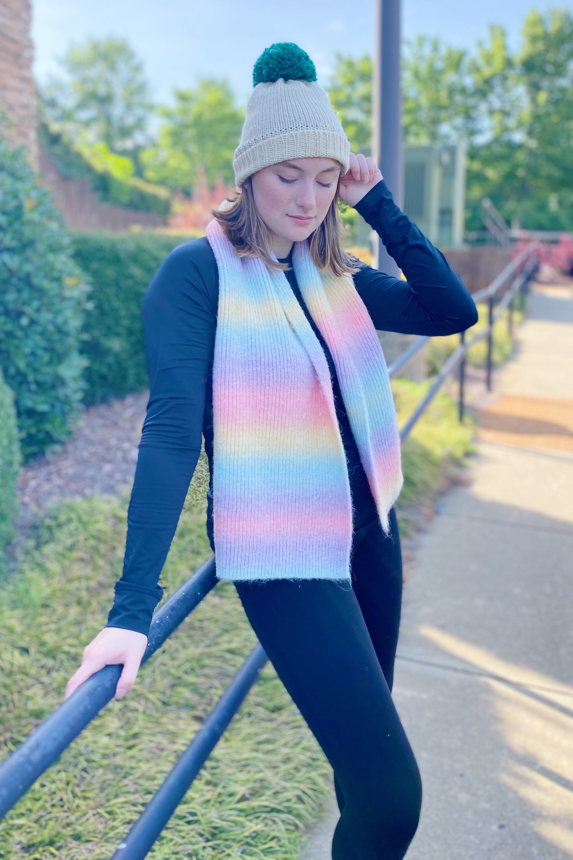 A vibrant Unicorn In My Dream Cozy Knit Scarf featuring a colorful knit pattern, perfect for adding warmth and style.