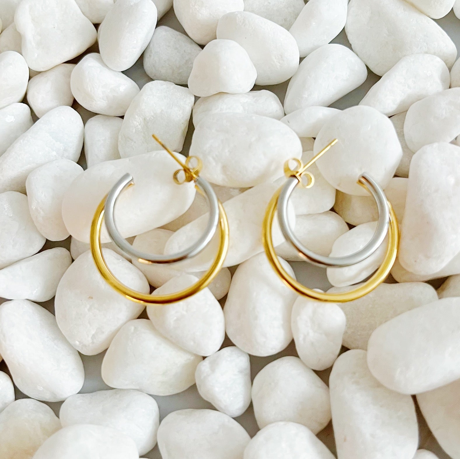 Elegant Uptown Two Tone Hoop Earrings featuring a modern design with 18k gold plating, perfect for any occasion.