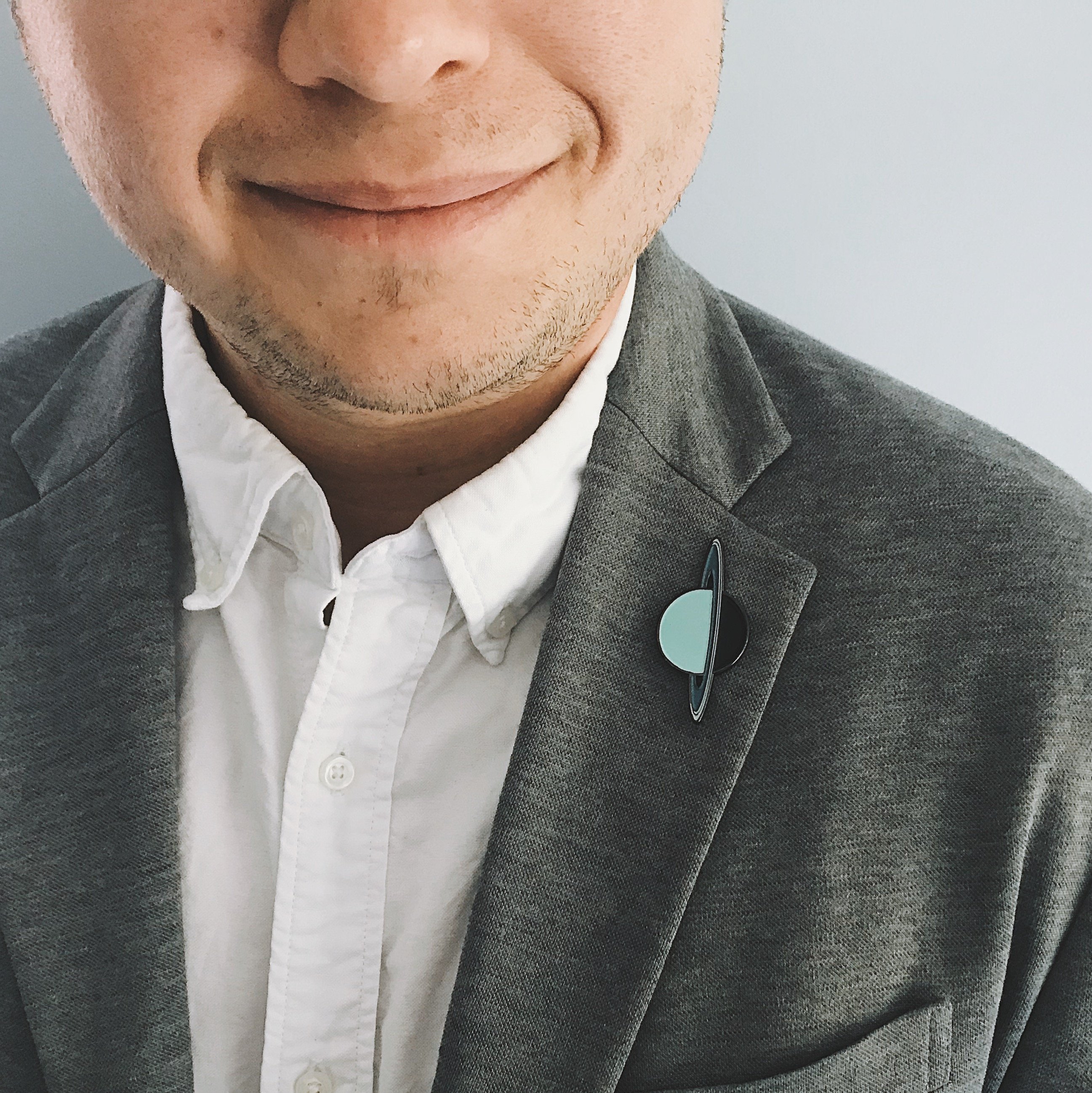 Uranus Enamel Pin featuring a whimsical design by Lauren Beacham, perfect for jackets and backpacks.