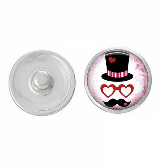 Handpressed snap featuring a whimsical mustache and hat design, perfect for Valentine's Day gifts and everyday wear.