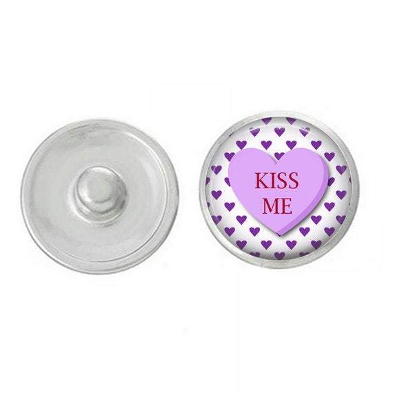 Valentines Day Kiss Me Snap Jewelry featuring a hand-pressed 7/8” round snap in vibrant colors, perfect for necklaces and bracelets.