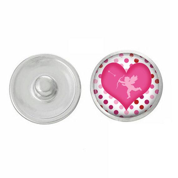 Cupid Heart Handpressed Snap in pink, featuring a heart design, perfect for Valentine's Day gifts and everyday wear.
