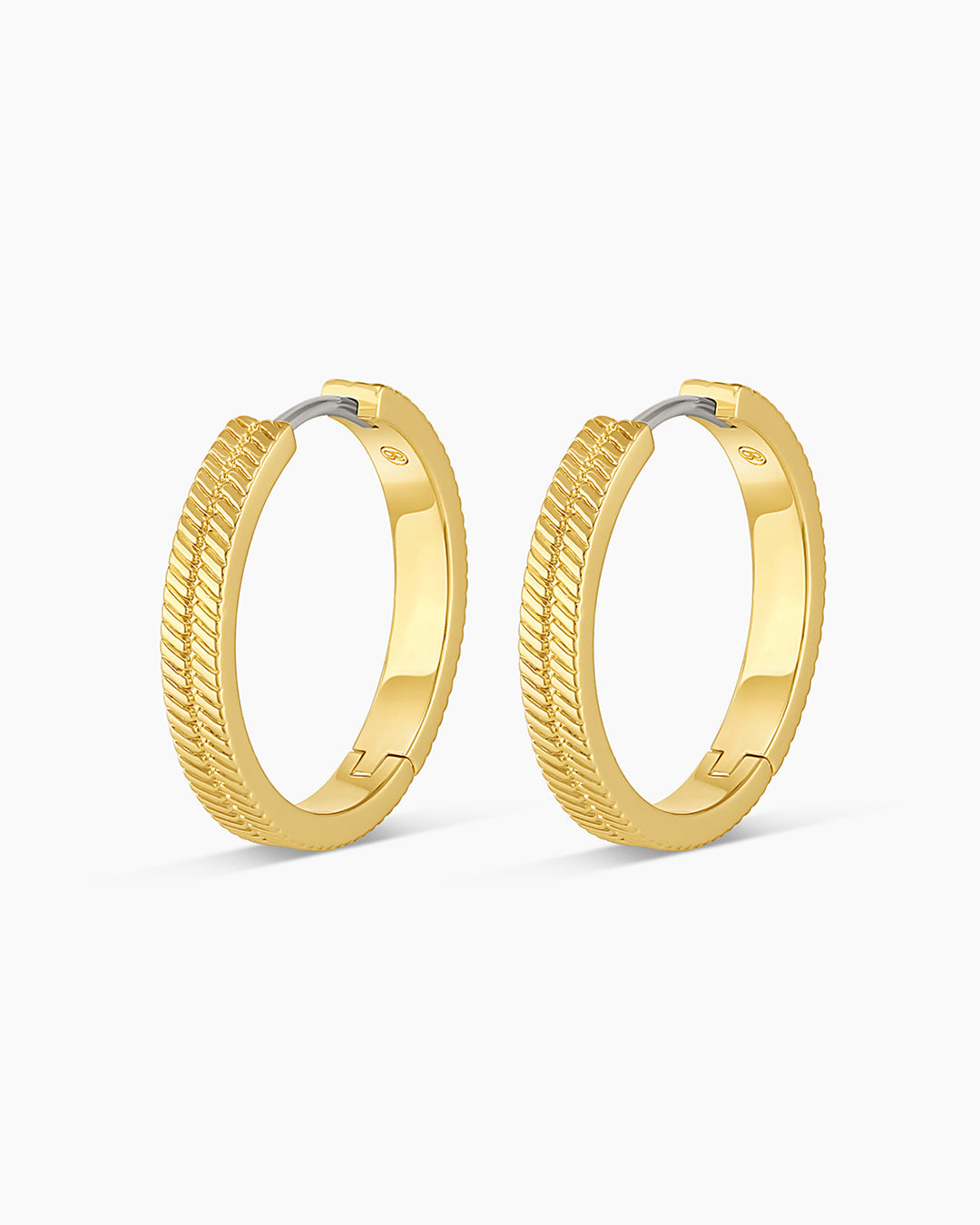 Elegant 14k gold hoop earrings, perfect for layering and everyday wear.