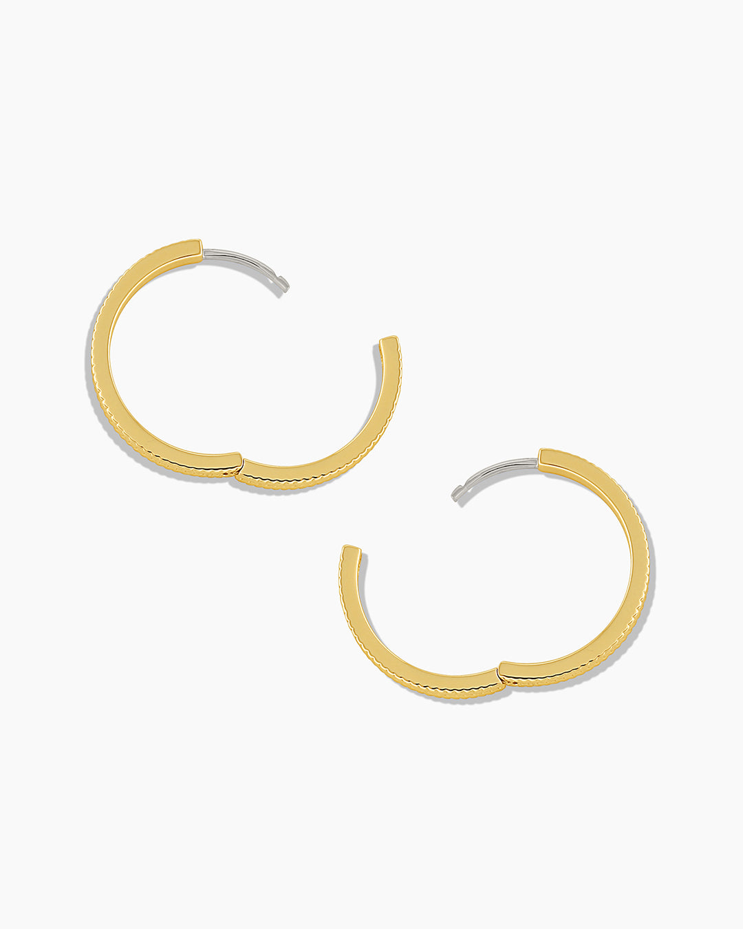 Elegant Venice Hoops crafted with high-quality materials, showcasing a sleek design perfect for any outfit.