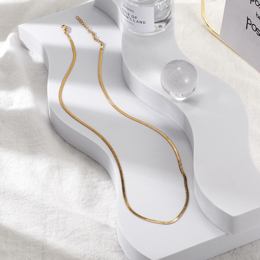 Elegant Venice Necklace displayed on a soft background, showcasing its lightweight chain design and available widths.