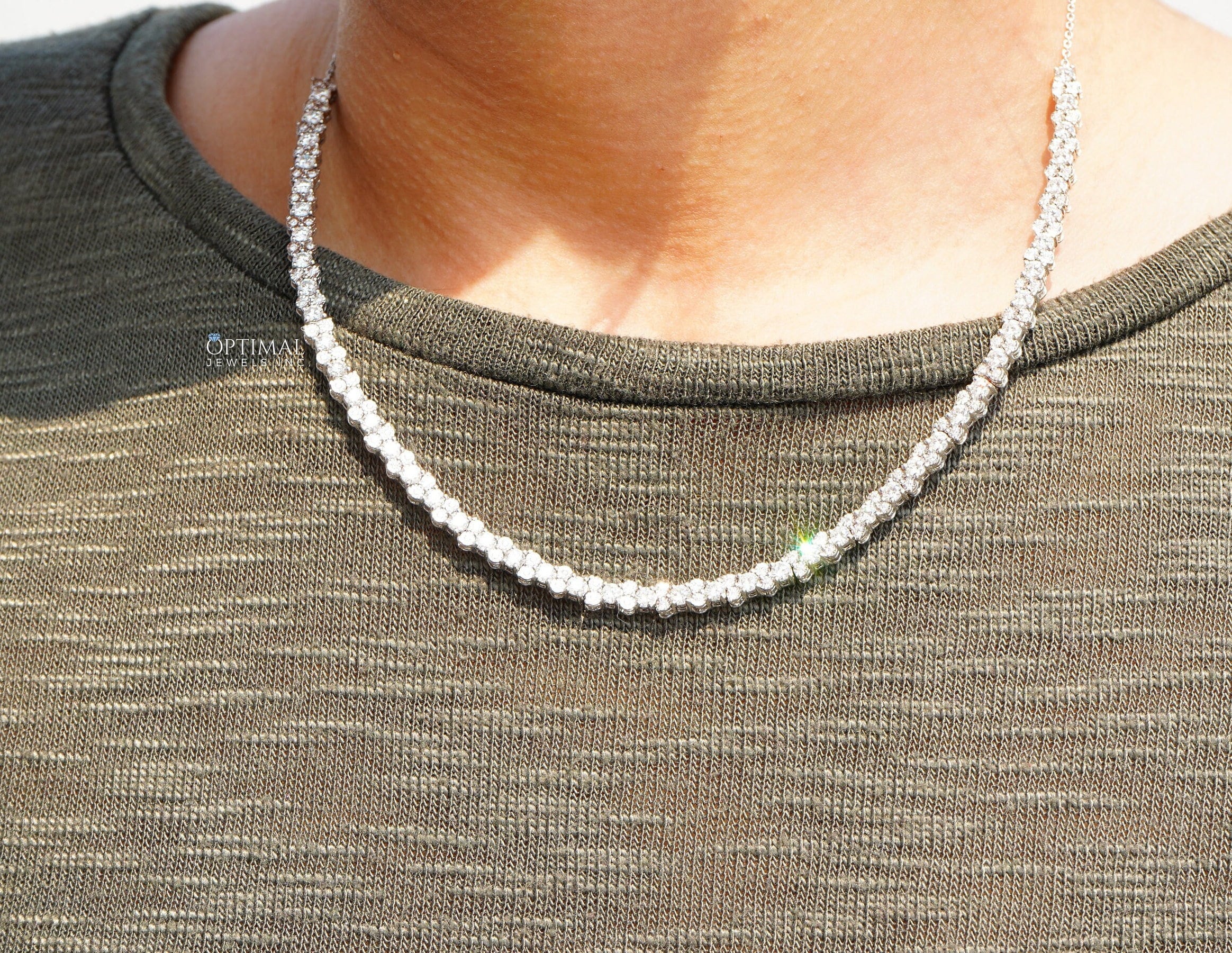 Versatile Lab Grown Diamond Cluster Tennis Necklace featuring 2.5 Ctw round cut diamonds, elegantly displayed on a soft background.