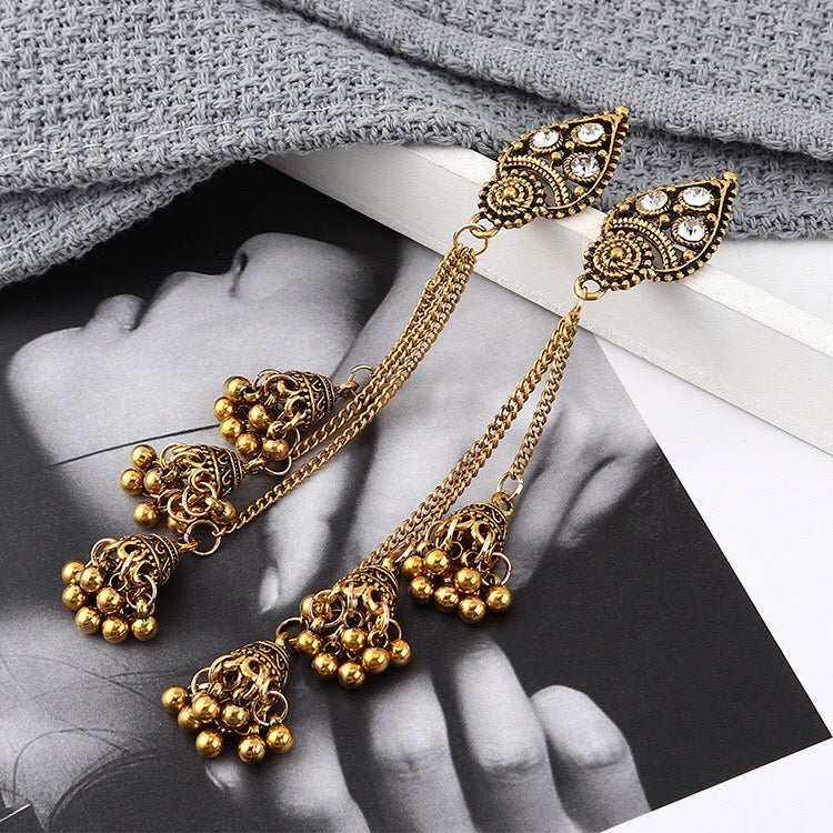 Vintage Lantern Triple Bell Tassel Earrings featuring alloy and rhinestone accents, showcasing a unique and elegant design.