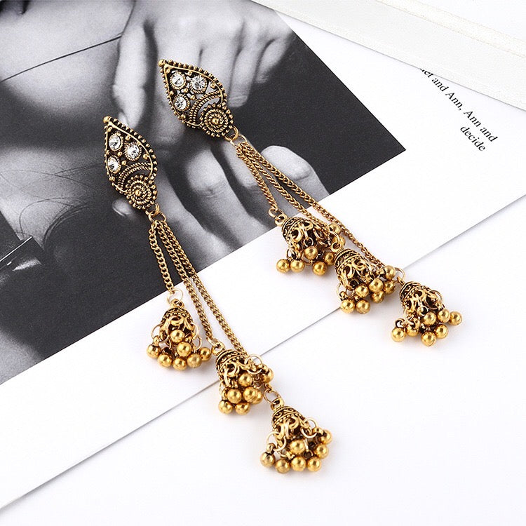 Vintage Lantern Triple Bell Tassel Earrings featuring alloy and rhinestone accents, showcasing a unique and elegant design.