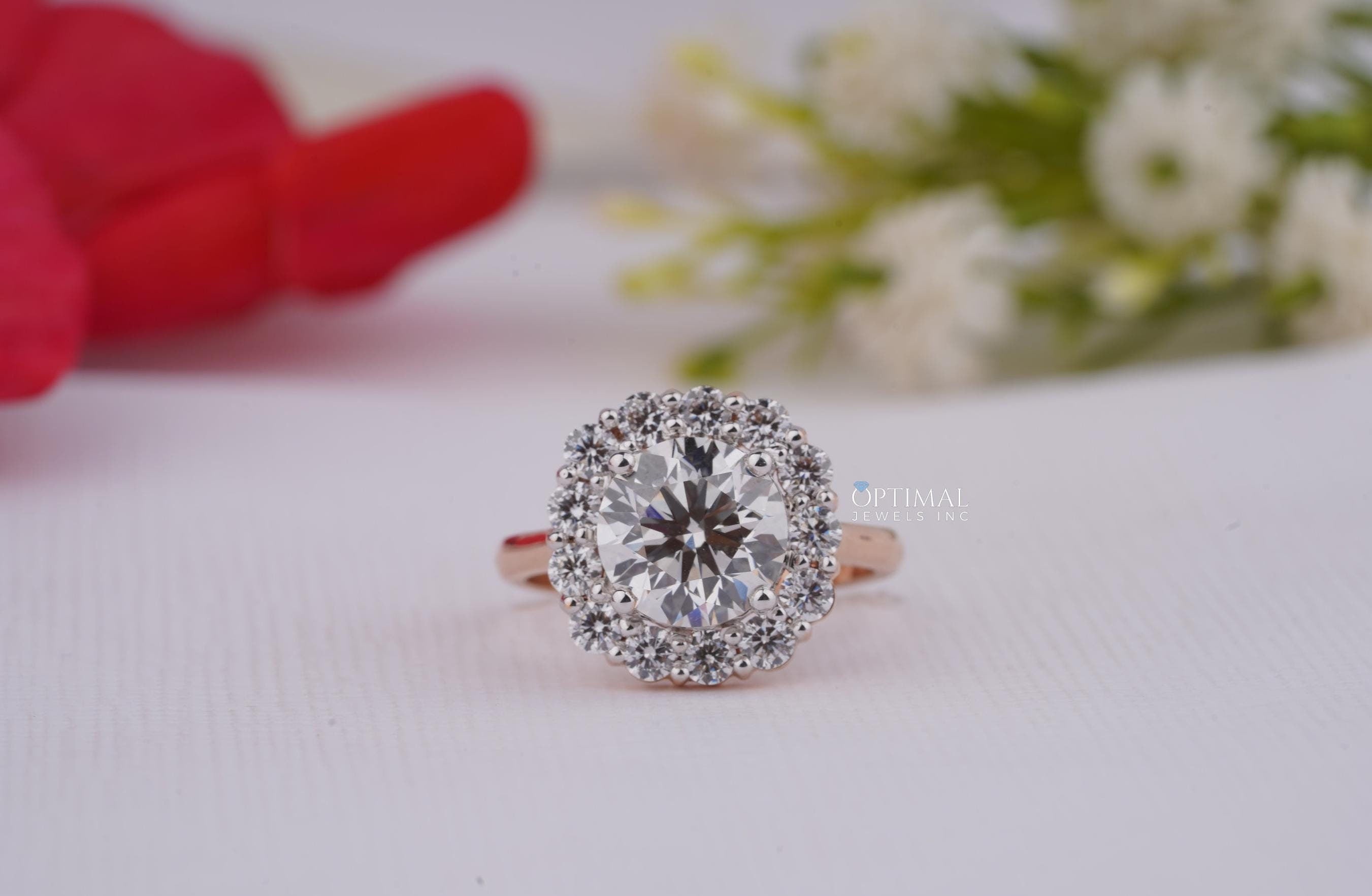 Vintage style lab grown diamond ring featuring a 3.50 Ctw round cut halo diamond set in rose gold, showcasing elegance and craftsmanship.