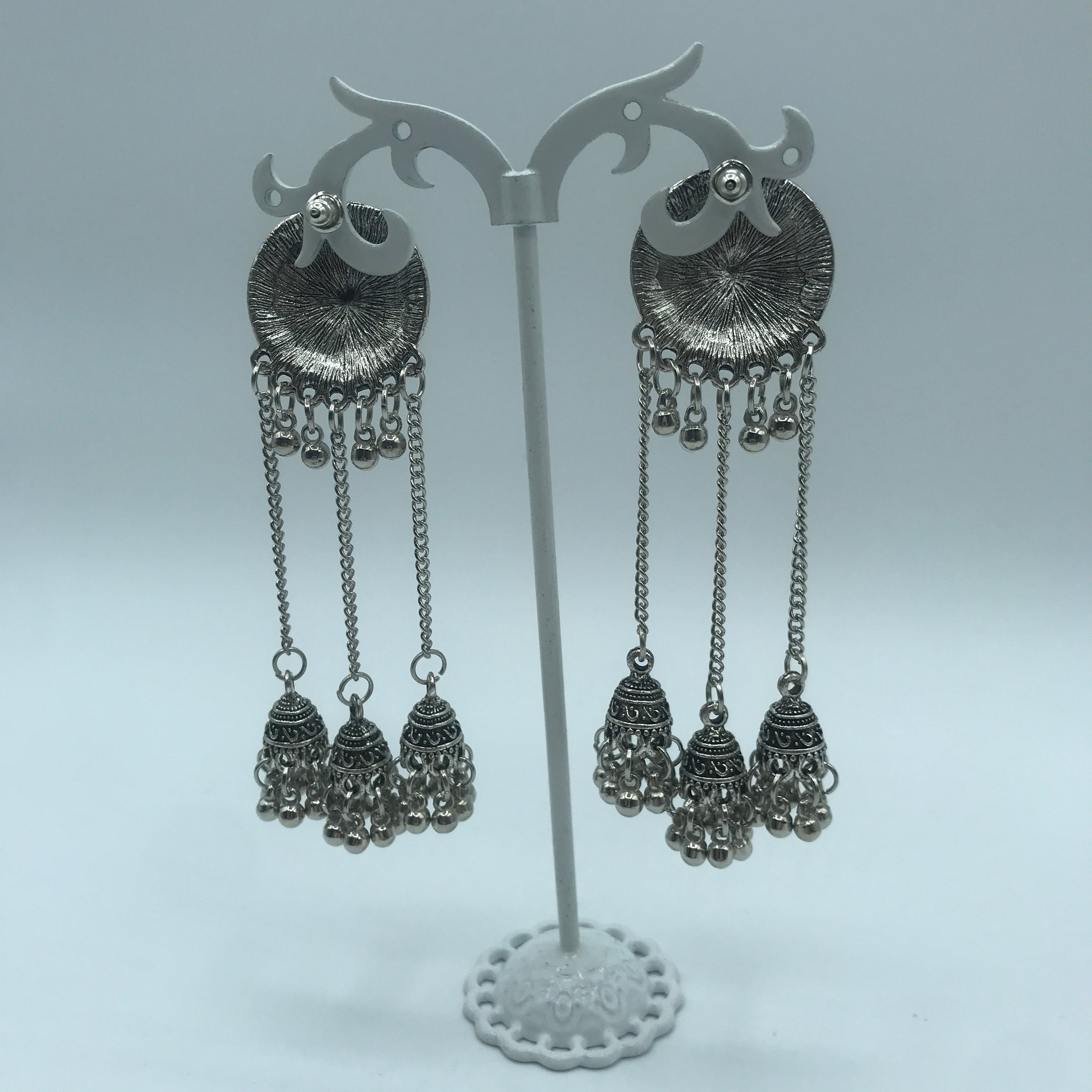 Vintage sunflower triple bell tassel earrings featuring intricate sunflower design and playful tassels, crafted from lightweight alloy.