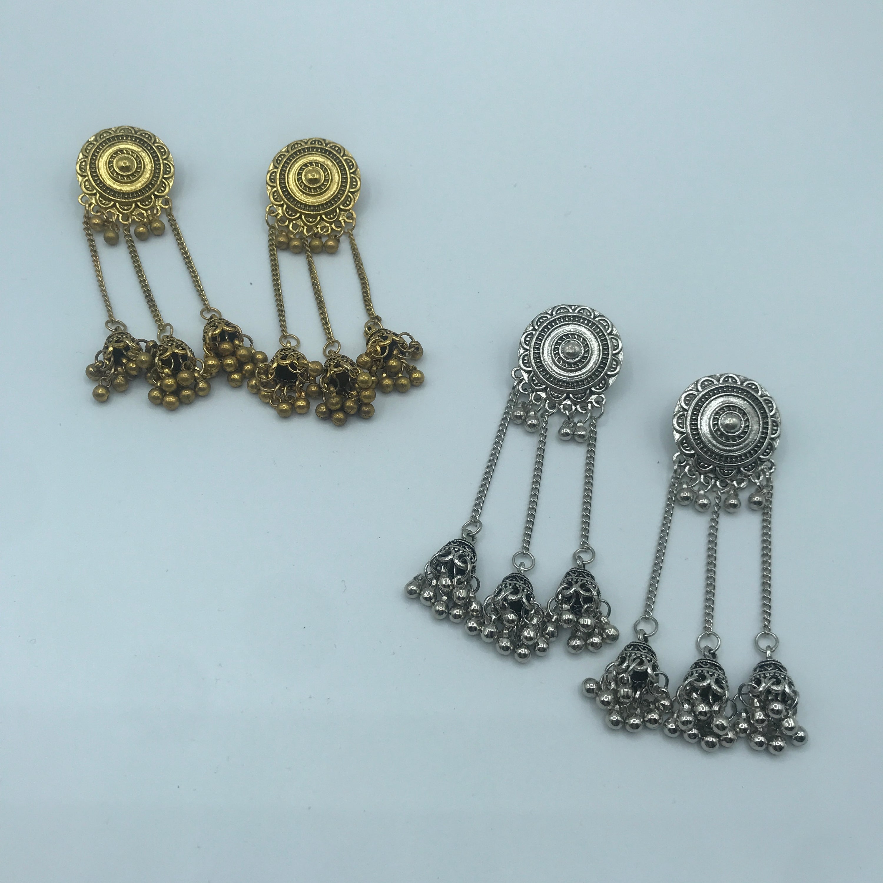 Vintage sunflower triple bell tassel earrings featuring intricate sunflower design and playful tassels, crafted from lightweight alloy.