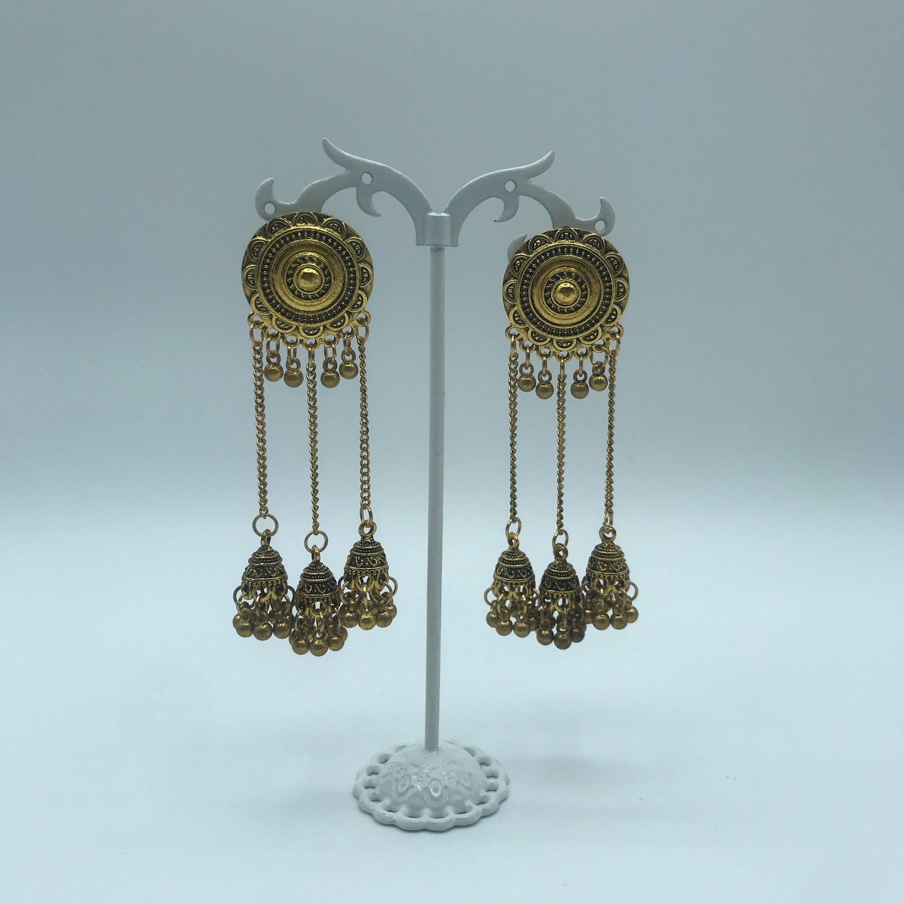 Vintage sunflower triple bell tassel earrings featuring intricate sunflower design and playful tassels, crafted from lightweight alloy.