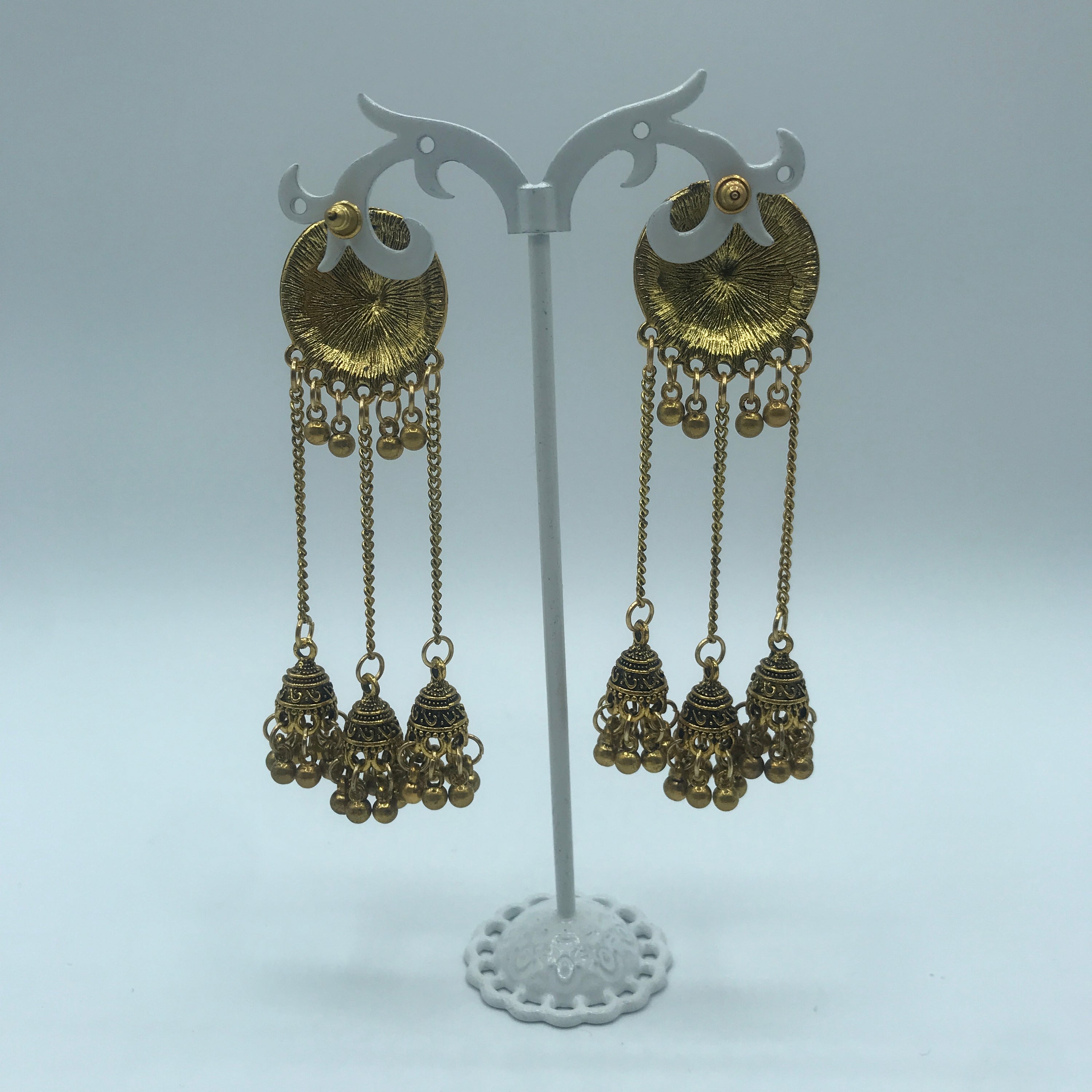 Vintage sunflower triple bell tassel earrings featuring intricate sunflower design and playful tassels, crafted from lightweight alloy.