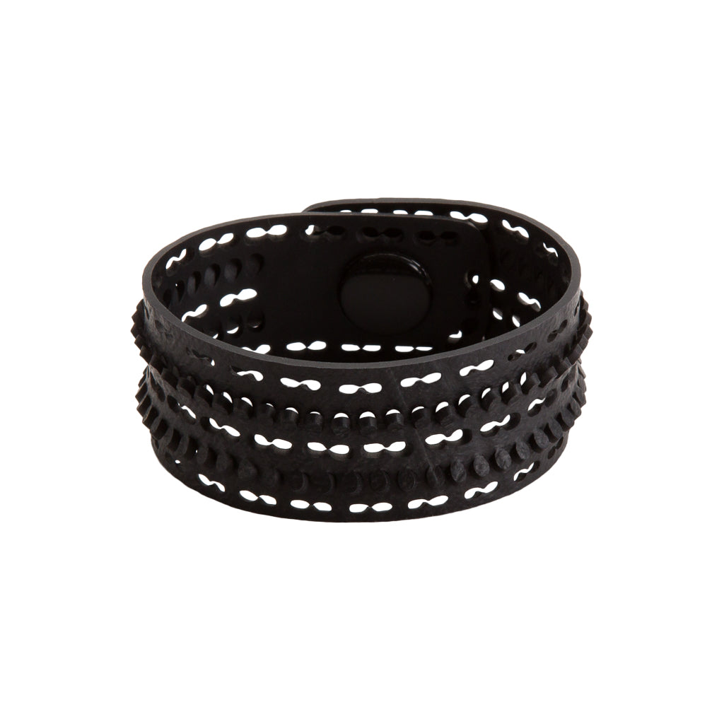 Vita Unique Recycled Rubber Bracelet, handcrafted from upcycled inner tubes, showcasing unique patterns and a slim design.