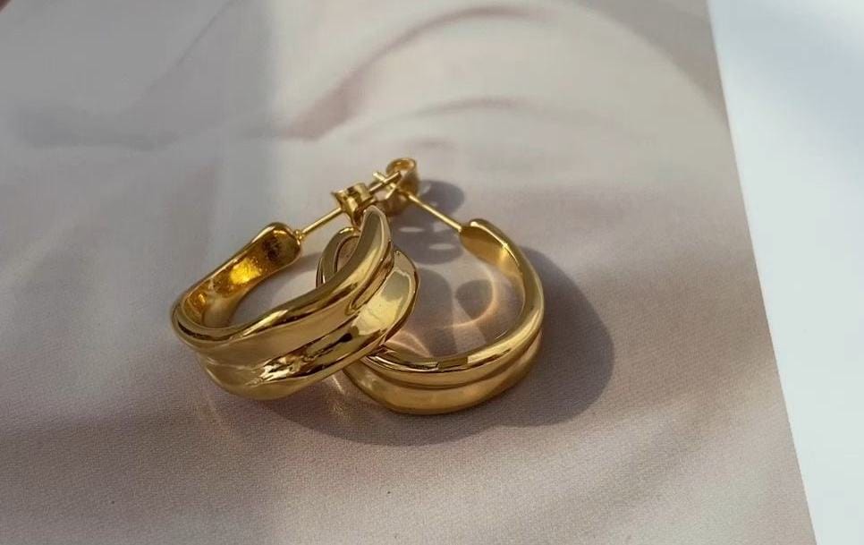 Vitenka Textured Uneven Hoop Earrings showcasing a contemporary design in stainless steel with 18Kt yellow gold coating.