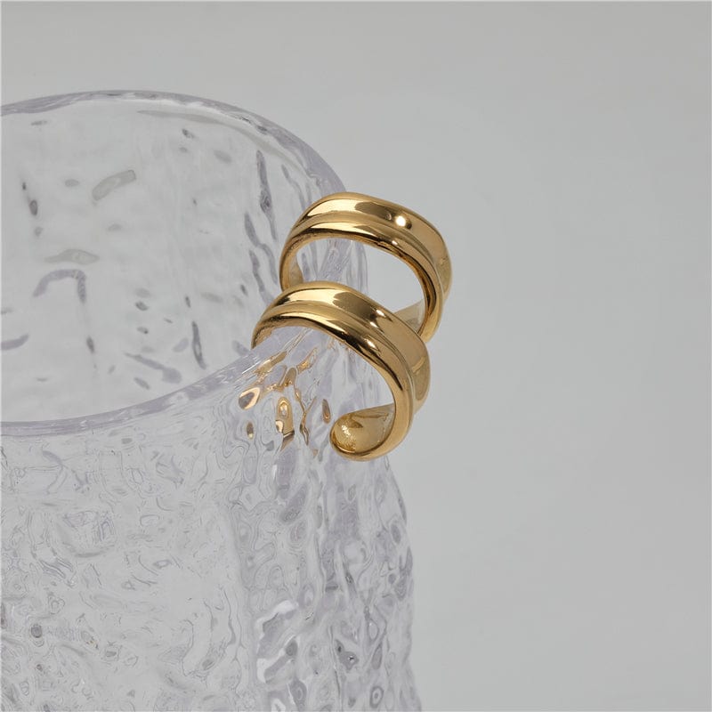 Vitenka Textured Uneven Hoop Earrings showcasing a contemporary design in stainless steel with 18Kt yellow gold coating.