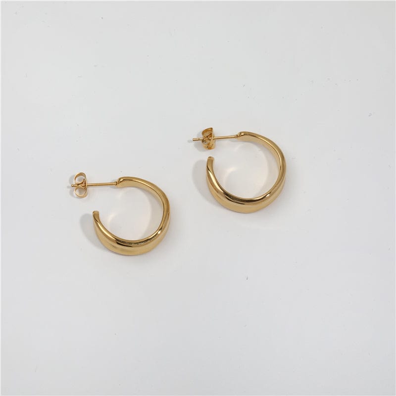 Vitenka Textured Uneven Hoop Earrings showcasing a contemporary design in stainless steel with 18Kt yellow gold coating.