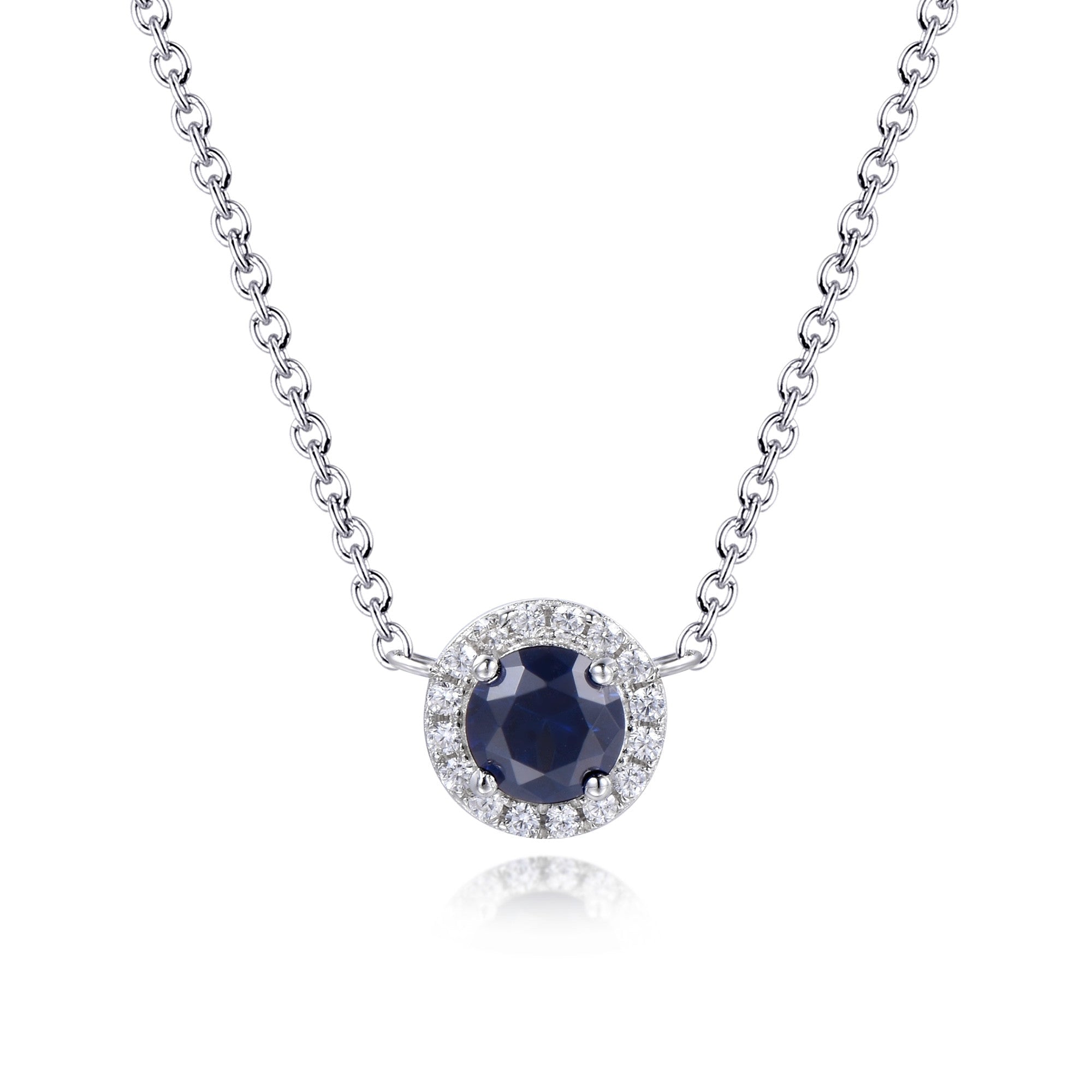 A beautiful tanzanite necklace featuring white sapphire, crafted from 925 sterling silver with a white gold finish, elegantly displayed on a soft background.