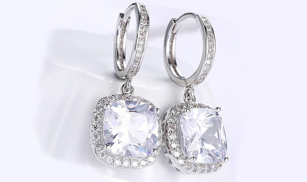 Elegant White Asscher Cut Dangling Lever Back Earrings in 14K White Gold, showcasing their brilliant sparkle and sophisticated design.