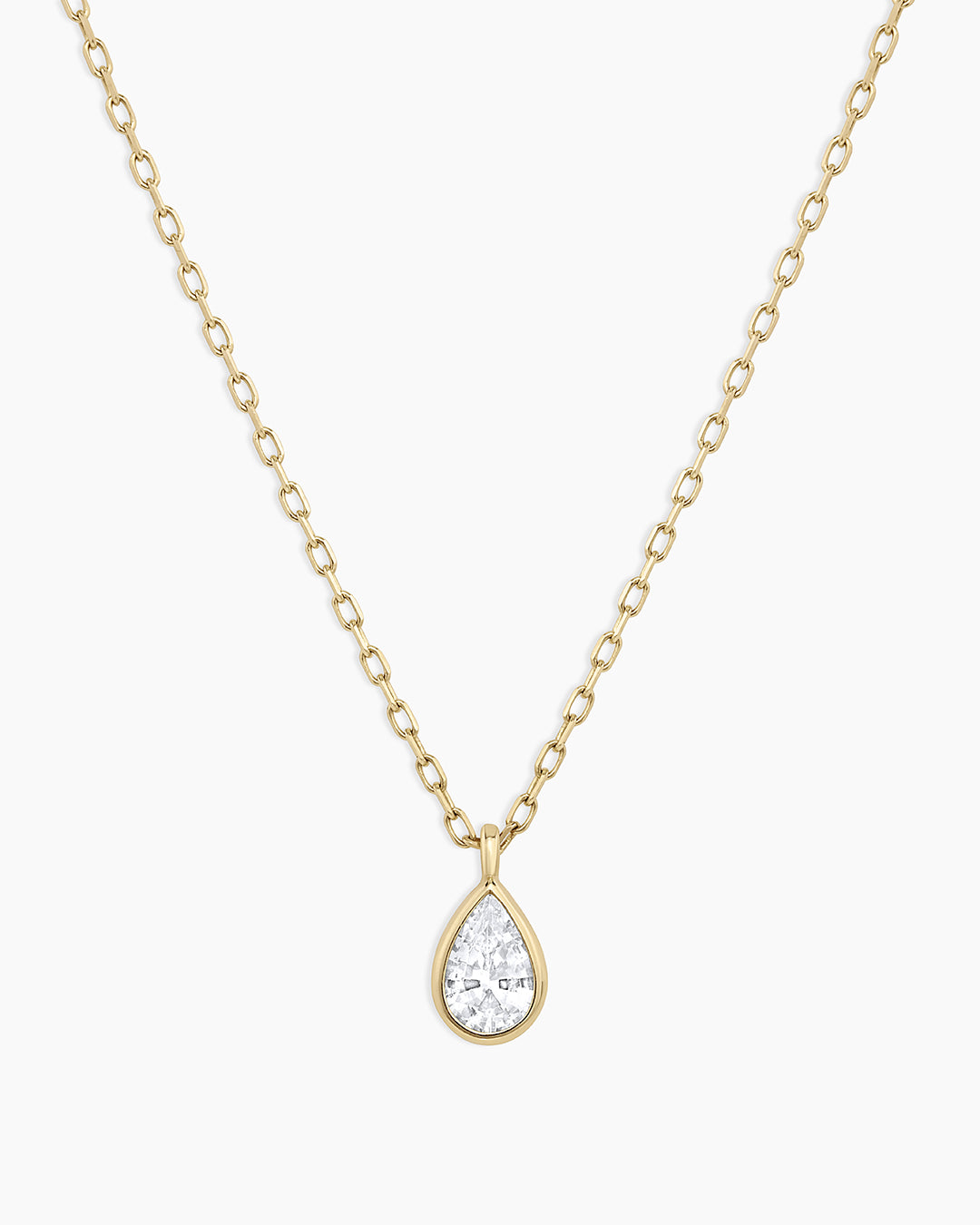 Elegant White Sapphire Pear Charm Necklace featuring sparkling white sapphires in a pear-shaped design, perfect for any occasion.