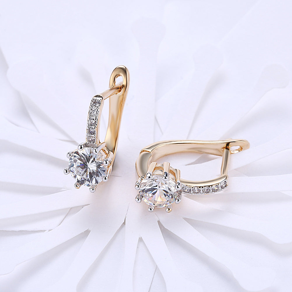 Elegant White Topaz 0.70 CT Round Huggie Earring in 18K White Gold Plated, showcasing its sparkling gemstone and luxurious finish.