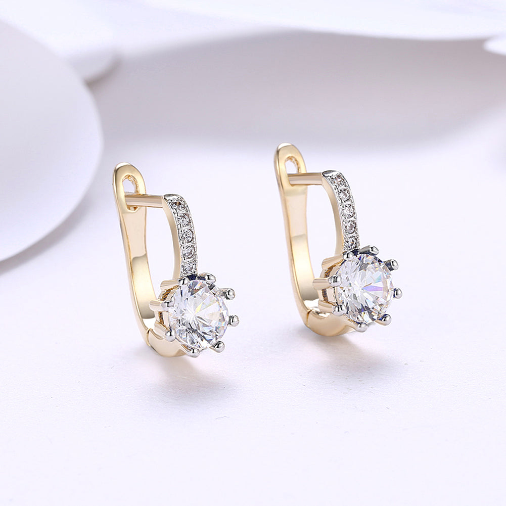 Elegant White Topaz 0.70 CT Round Huggie Earring in 18K White Gold Plated, showcasing its sparkling gemstone and luxurious finish.