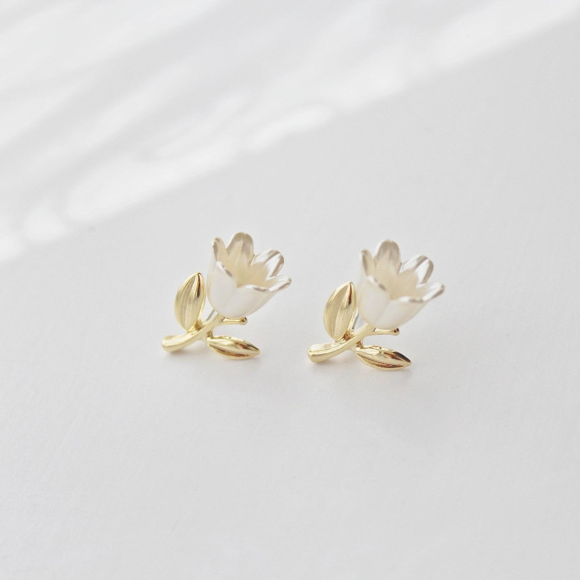 Elegant White Tulip Earrings featuring silky white flowers and gold leaves, perfect for gifting or personal wear.