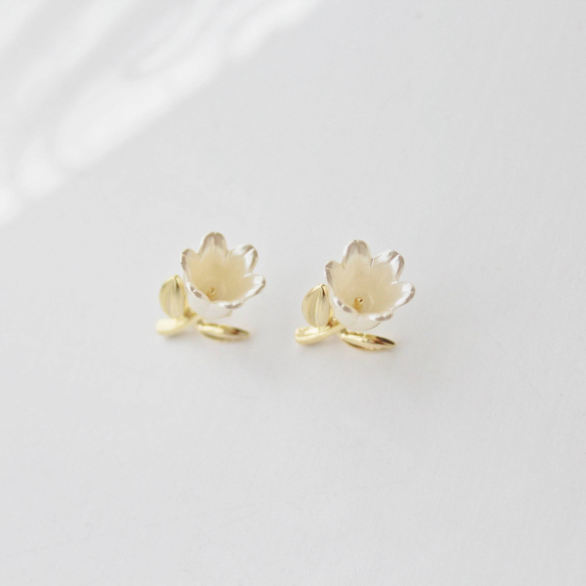 Elegant White Tulip Earrings featuring silky white flowers and gold leaves, perfect for gifting or personal wear.