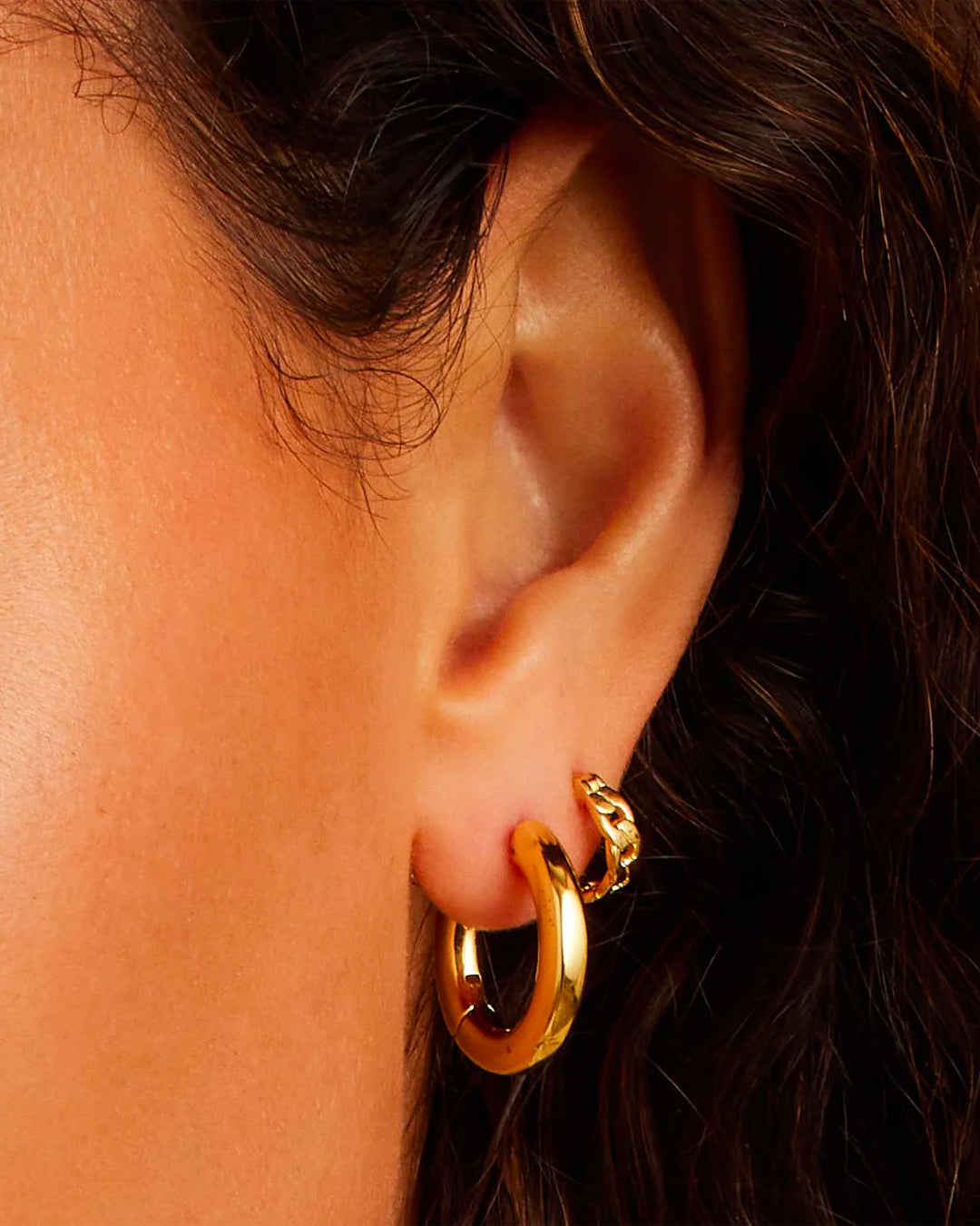 Wild Side Huggie Set featuring elegant gold-plated earrings designed for stacking and layering.