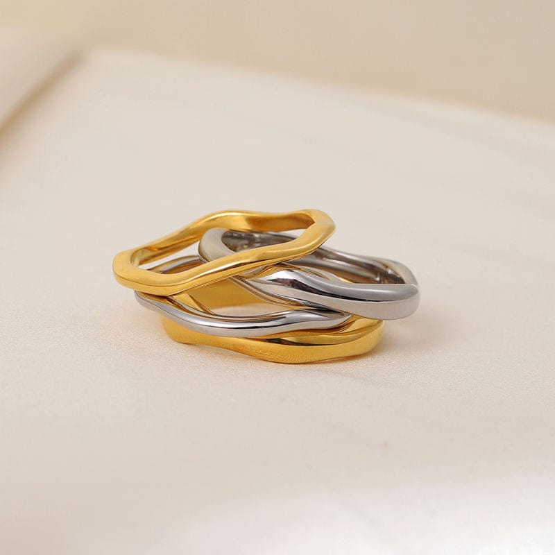 Elegant Winter Double Ring Gold made of titanium steel with 18k gold plating, showcasing a unique double ring design.
