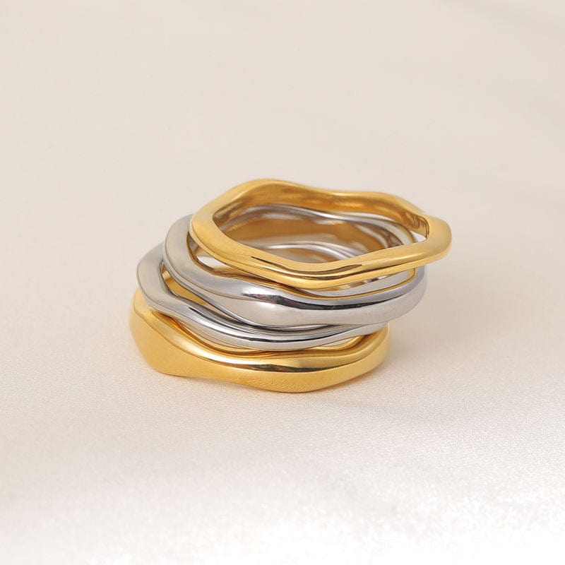 Elegant Winter Double Ring Gold made of titanium steel with 18k gold plating, showcasing a unique double ring design.