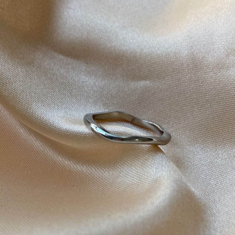 Elegant Winter Double Ring Gold made of titanium steel with 18k gold plating, showcasing a unique double ring design.