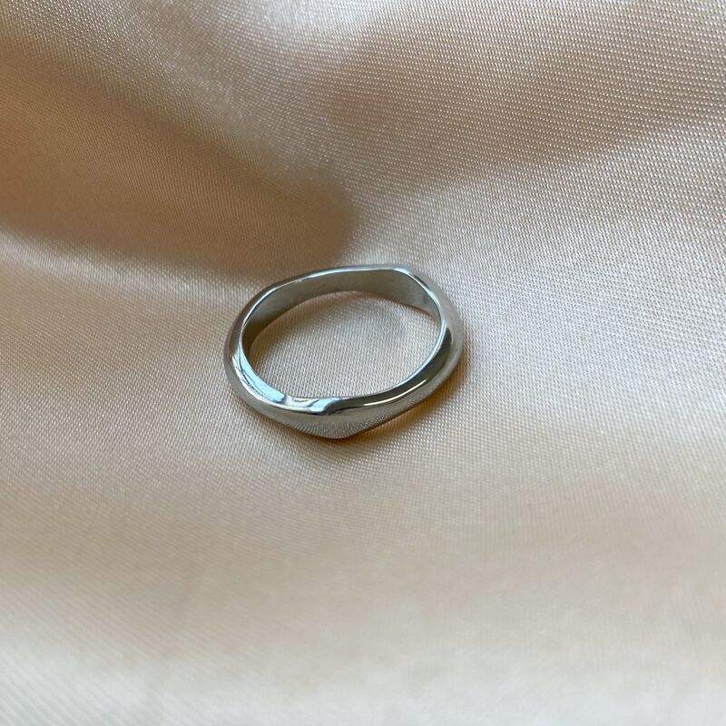 Elegant Winter Double Ring Gold made of titanium steel with 18k gold plating, showcasing a unique double ring design.