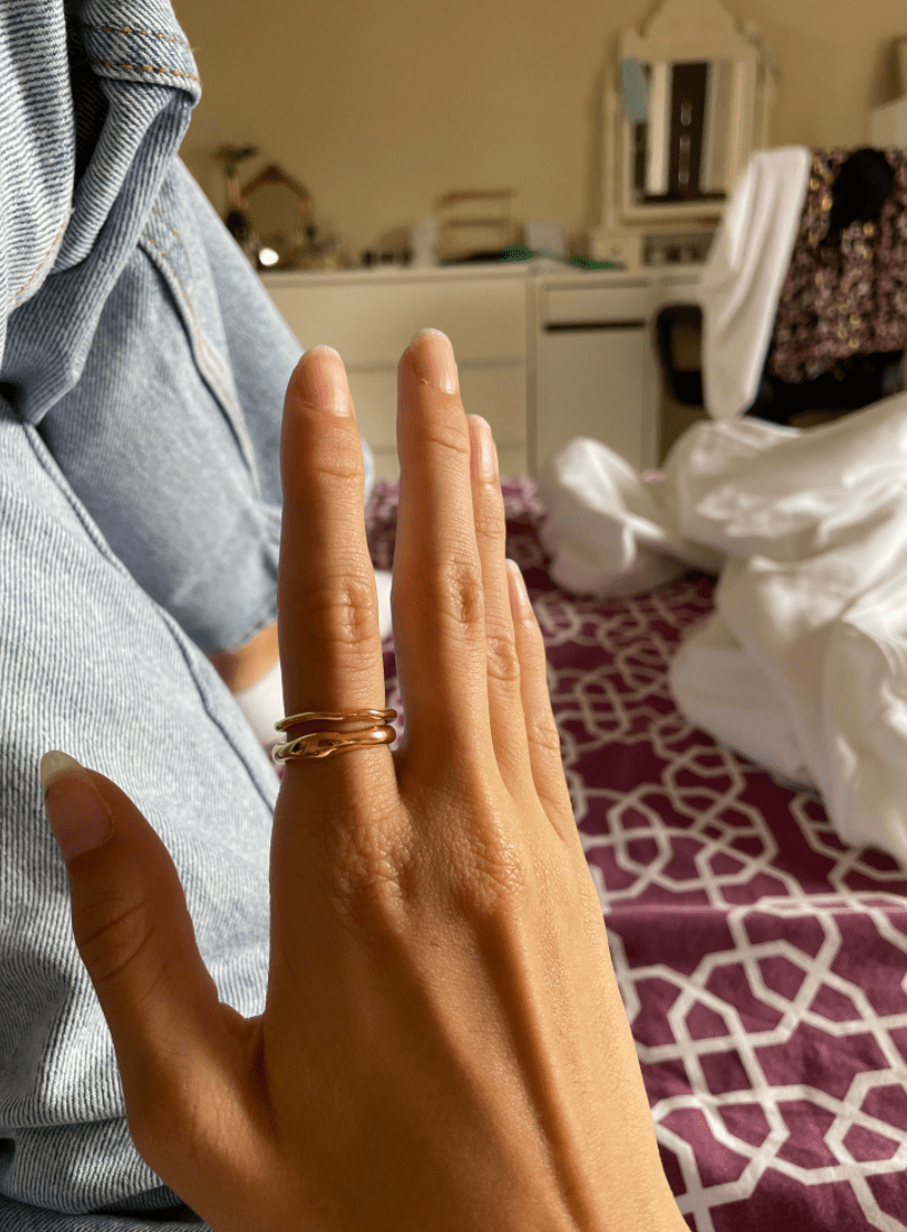 Elegant Winter Double Ring Gold made of titanium steel with 18k gold plating, showcasing a unique double ring design.