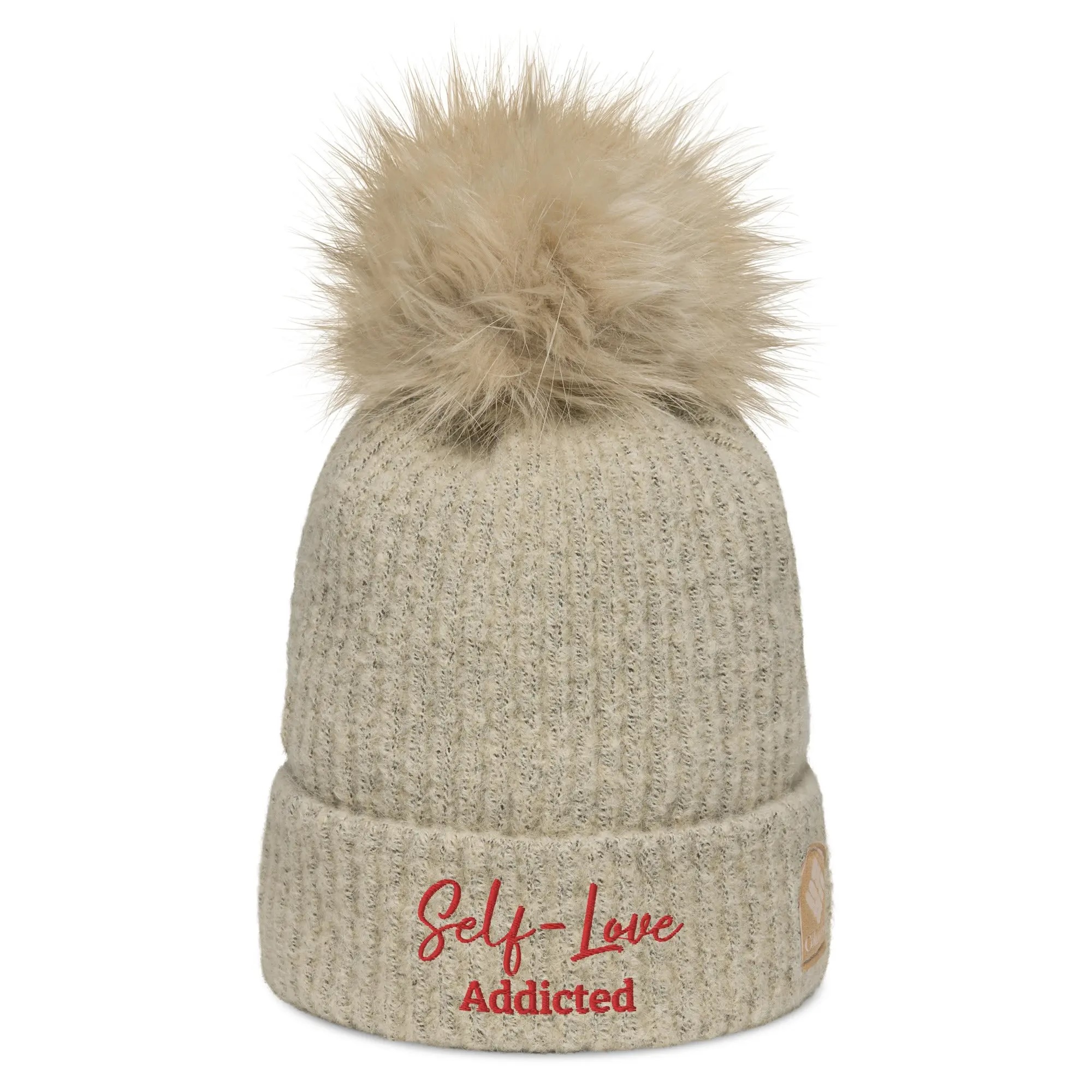 Cozy Columbia pom-pom beanie in winter, featuring fluffy pom on top and soft microfleece lining.